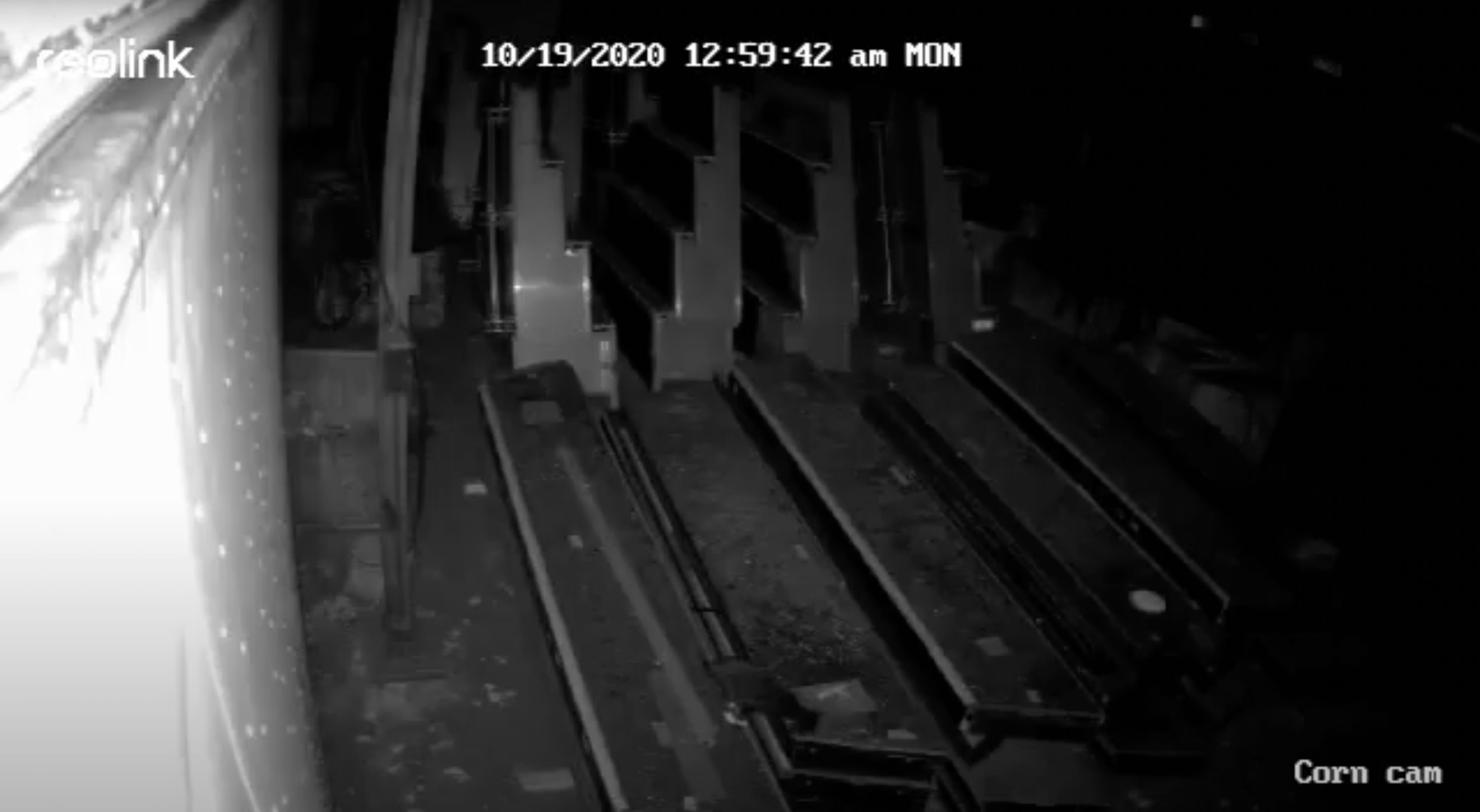 Marissa Lee Benedict, Daniel de Paula, and David Rueter, Video still from a security camera overlooking components of the Corn Pit, in storage in Chicago