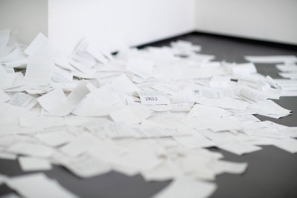 undefined, a conversation between machines about Mallarmé (regarding the state of the gallery lights), 2023, 2023, Wooden shelf, receipt printer, thermal paper, wiring and conduit, custom software, annotated text file containing Stéphane Mallarmé's poem 